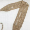 Le headband BOWIE Ida Degliame est un bandeau de crochet, fait main, qui rend hommage au soleil avec sa couleur chaude, un bronze intense. 